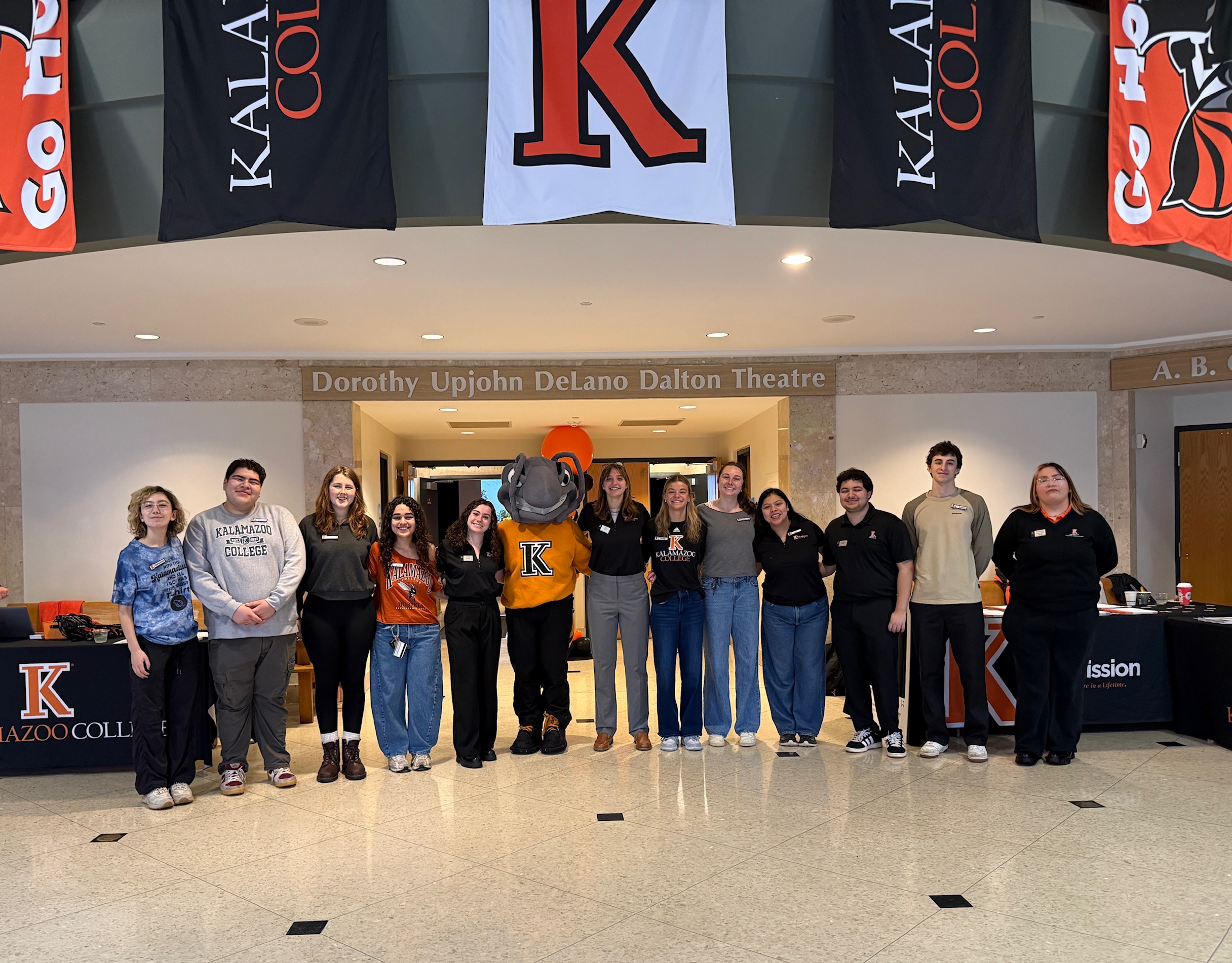 Group photo of Admission team and students with Buzz